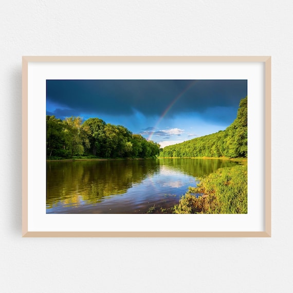 Faint Rainbow Over A Forest River On A Stormy Summer Day Poster