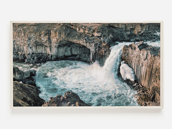 Waterfall Cascading Through Basalt Rock Columns Photo Poster