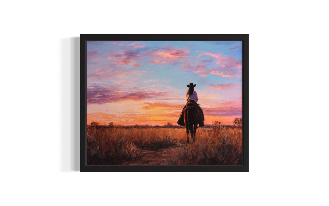 Lone Cowgirl Riding On Horseback Into The Golden Sunset Poster