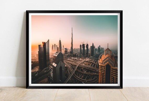 Dubai Skyline Sunset with Burj Khalifa and Highway Lights Poster