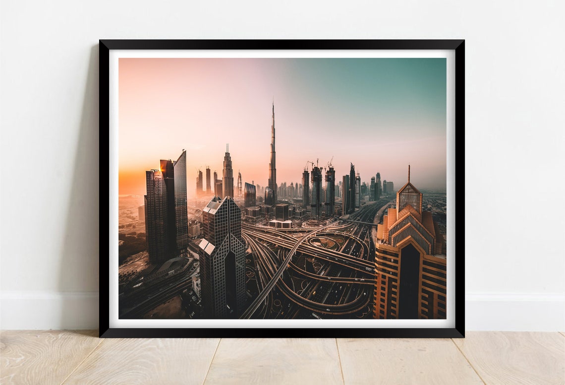 Dubai Skyline Sunset with Burj Khalifa and Highway Lights Poster