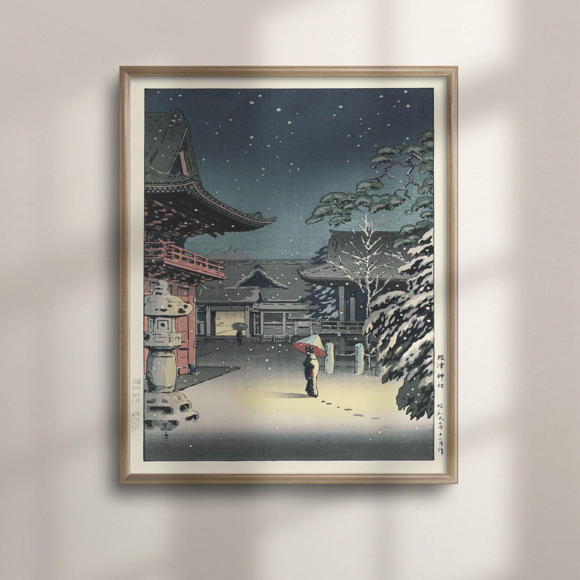Japanese Woodblock Snowy Night at a Shrine with a Red Umbrella Poster