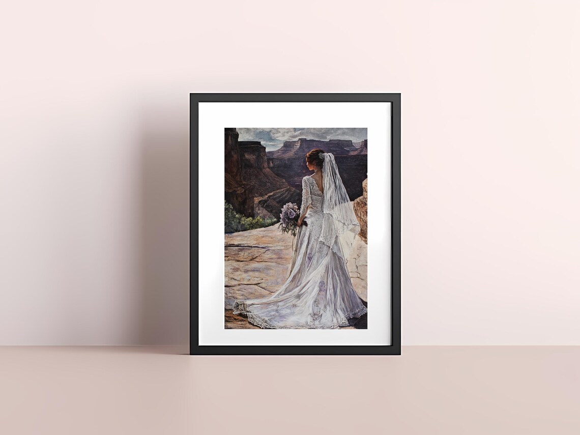 Elegant Bride in a Flowing White Dress at a Canyon Overlook Poster