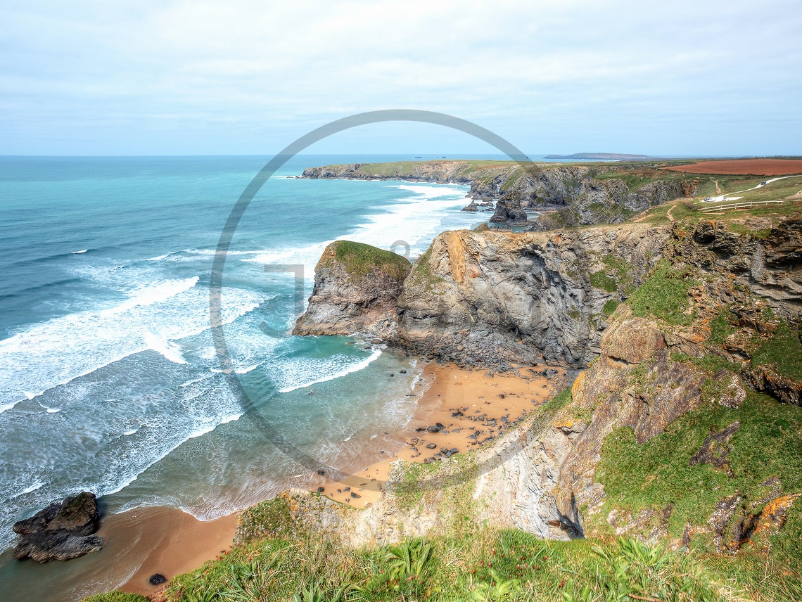Dramatic Sea Cliffs with Turquoise Waves and Sandy Cove Poster - Image 3