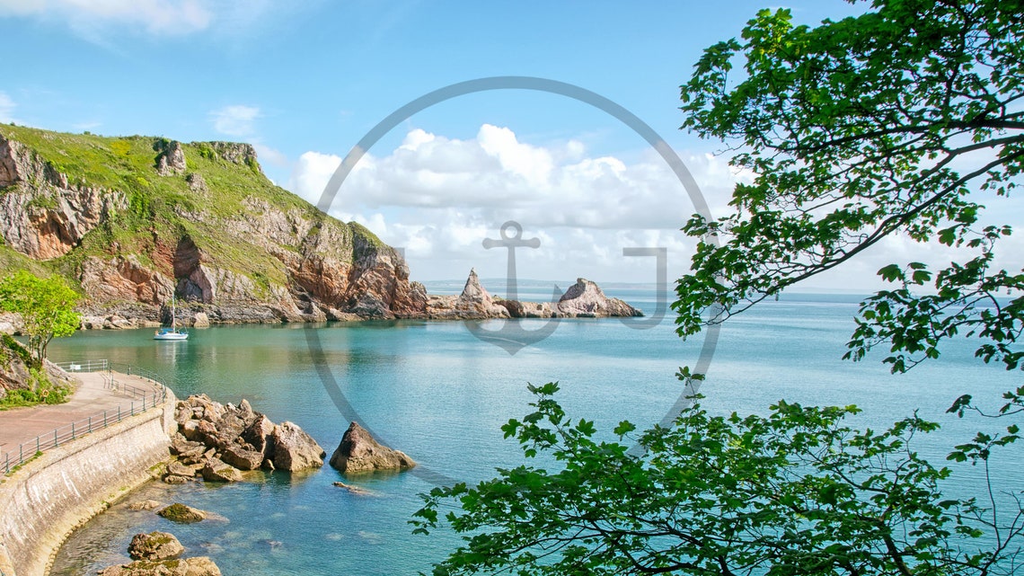 Rocky Headland With Sea Stacks and a Calm Blue Sea in Summer Poster - Image 3