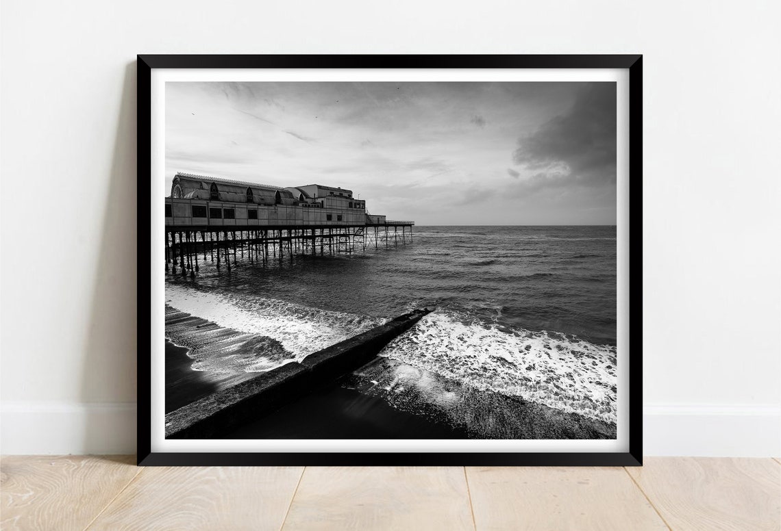 Black and White Victorian Seaside Pier Stretching Into the Sea Poster
