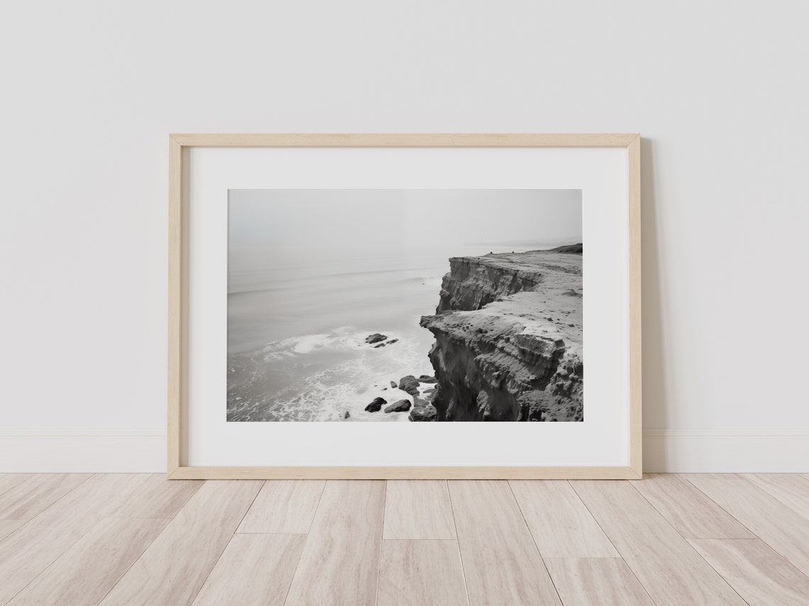 Black and White Coastal Cliff Photograph Above a Misty Ocean Poster