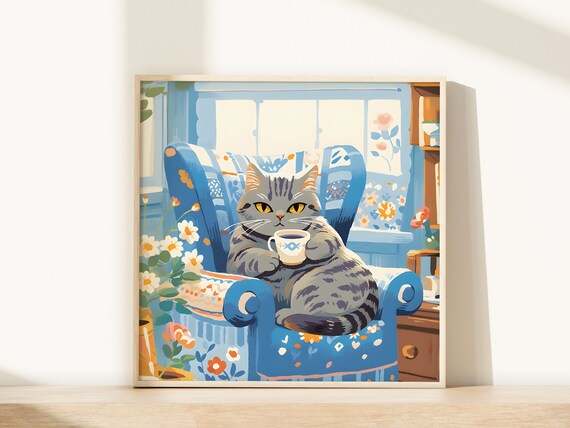 Content Silver Tabby Cat Holding Fish Mug in Blue Armchair Poster