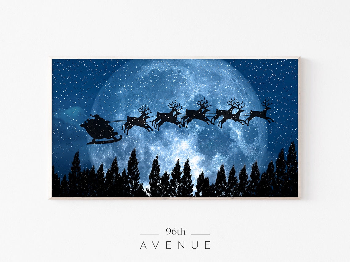 Santa Sleigh and Reindeer Silhouette Flying Past a Full Moon Poster