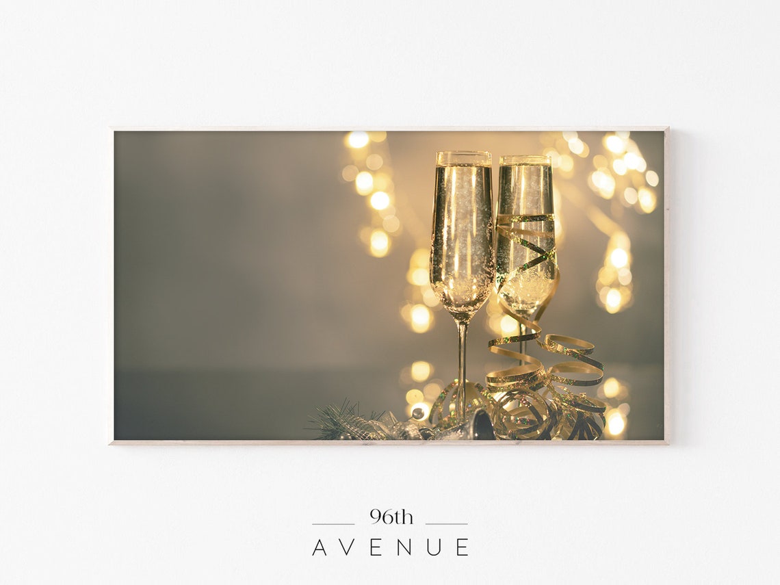 Golden Champagne Flutes with Bokeh Lights New Year Celebration Poster