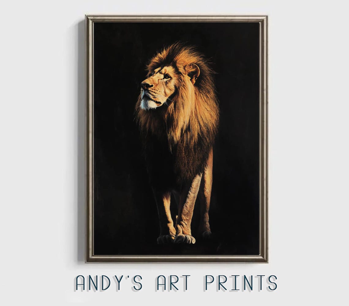 A Male Lion Standing Tall Against a Dramatic Black Backdrop Poster - Image 3