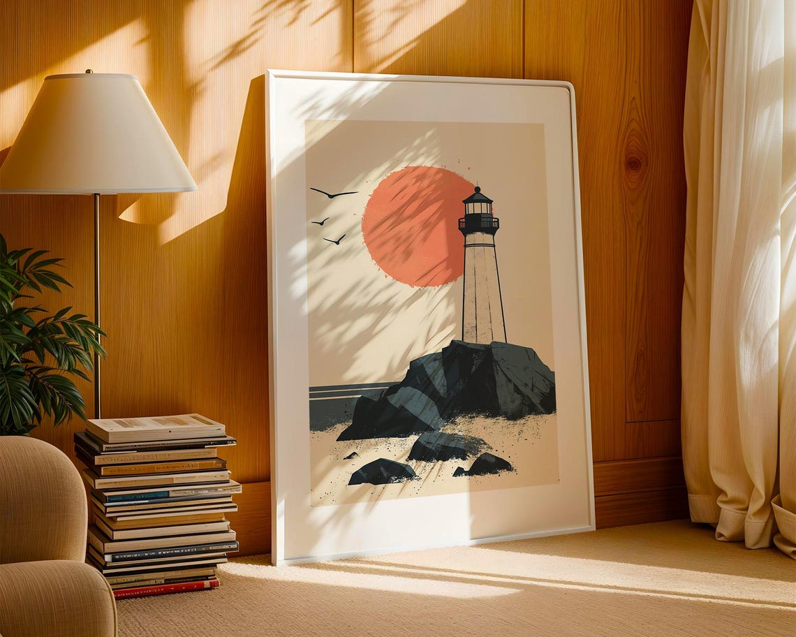 Minimalist Lighthouse on Rocky Shore Under a Big Orange Sun Poster - Image 2