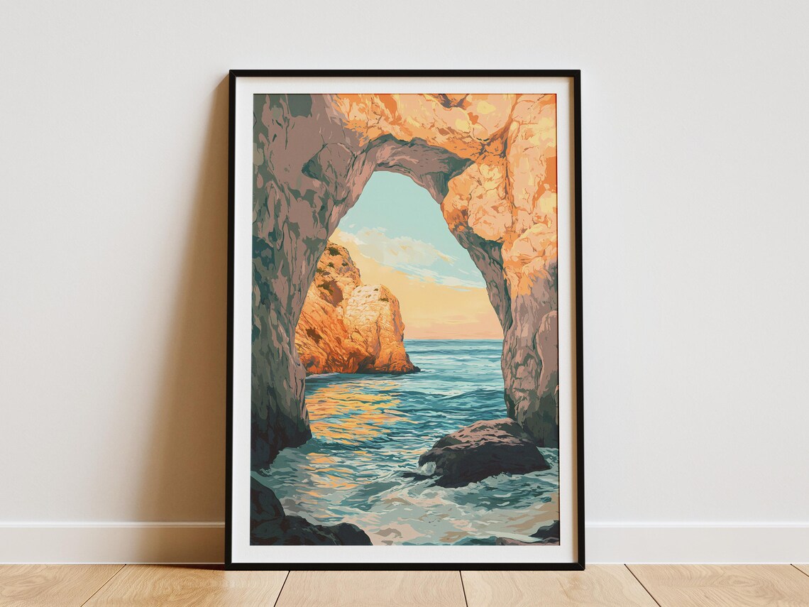 Sunset Sea View Through a Golden Rocky Coastal Arch Window Poster