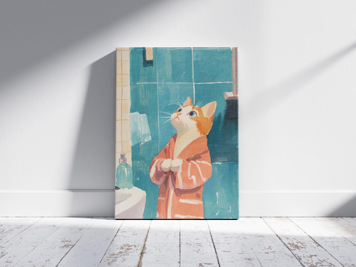 Kitten in an Orange Bathrobe Looking Up Cute Bathroom Poster - Image 2