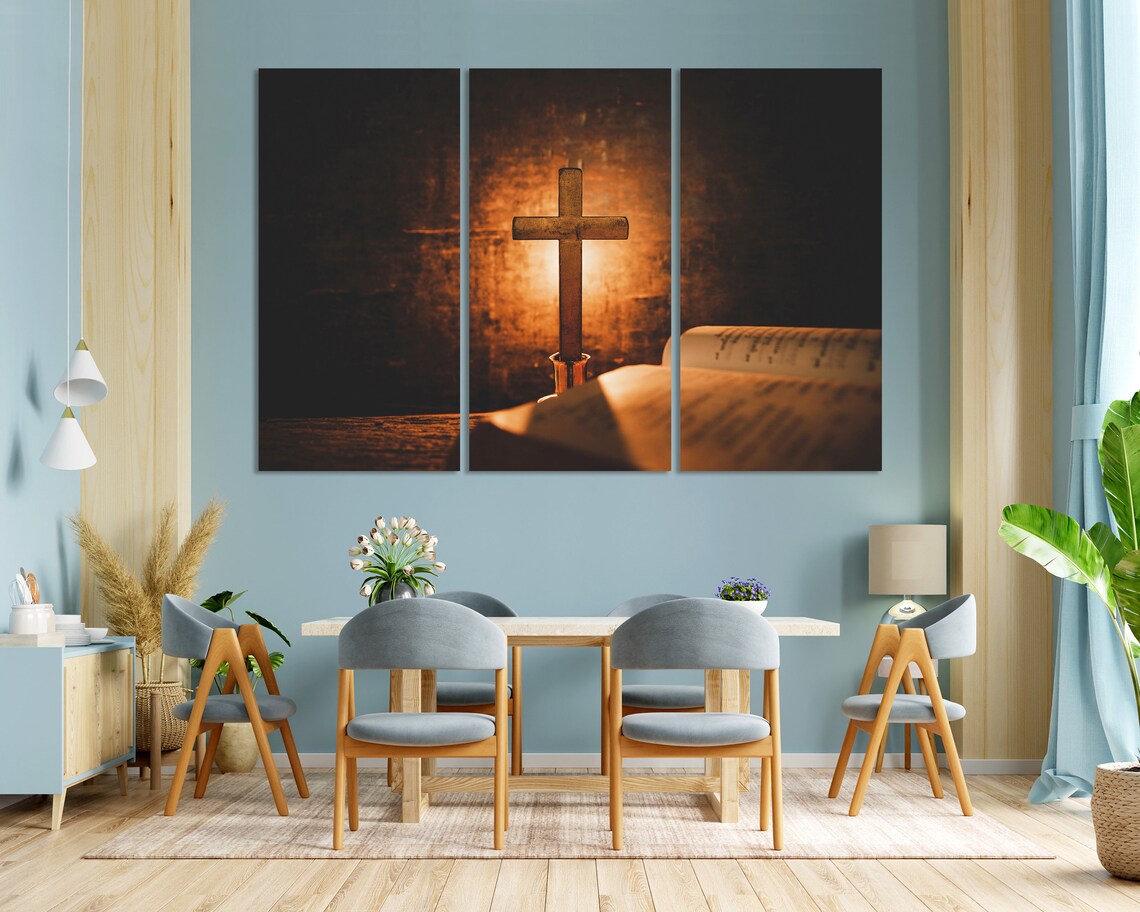 Wooden Cross Standing On Open Bible Warm Candlelight Glow Spiritual Poster