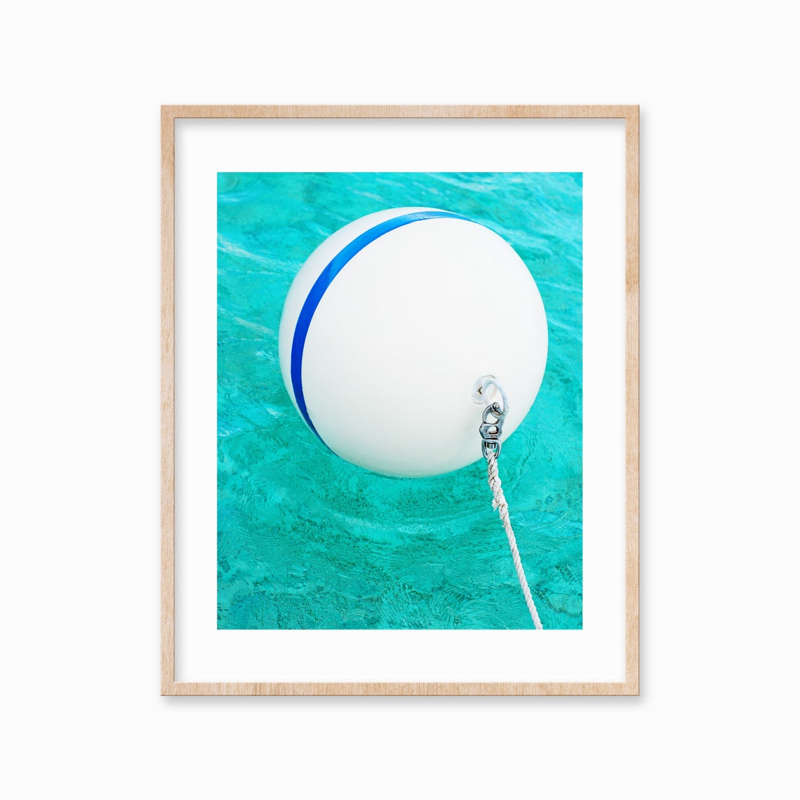 White Buoy with Blue Stripe Floating on Turquoise Water Poster