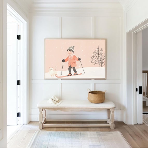 Smiling Boy Skiing with a Little White Cat on a Pink Snowy Day Poster