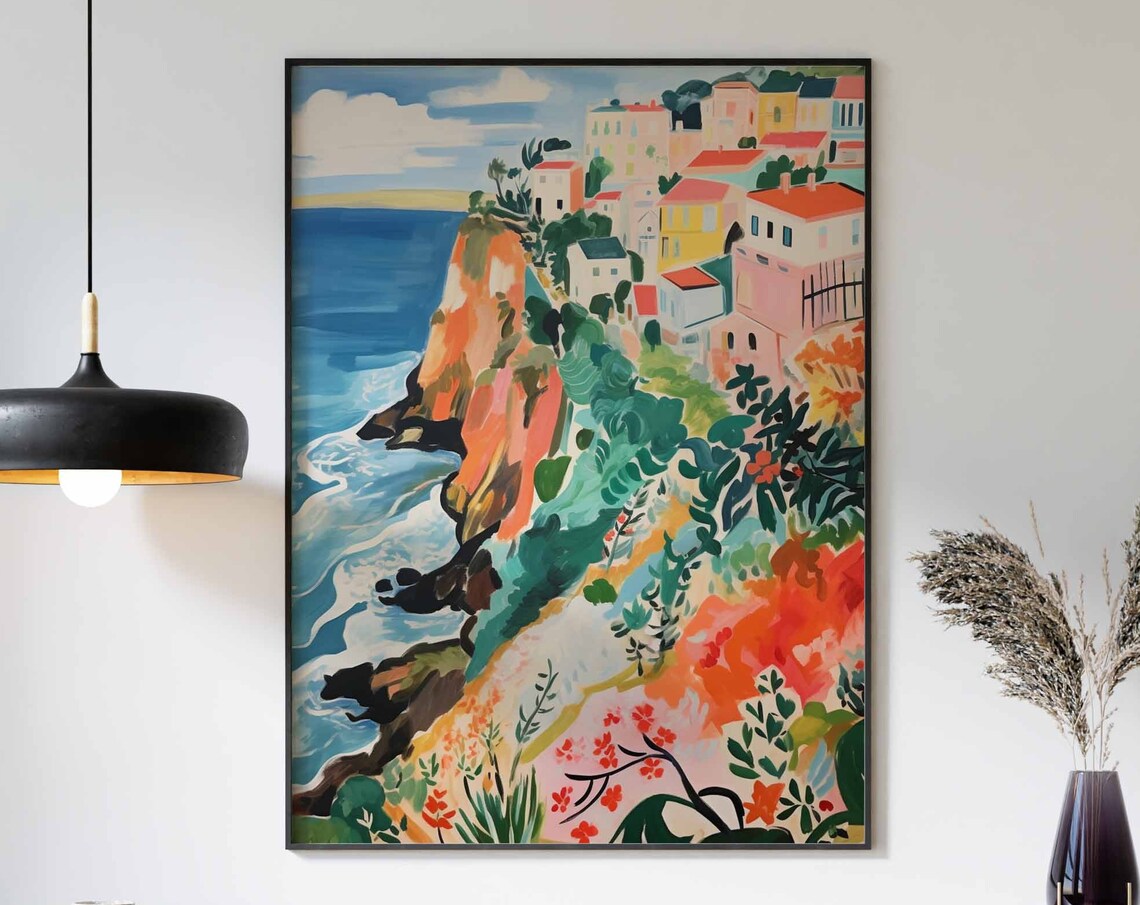 Colorful Cliffside Village Overlooking a Bright Blue Sea Poster