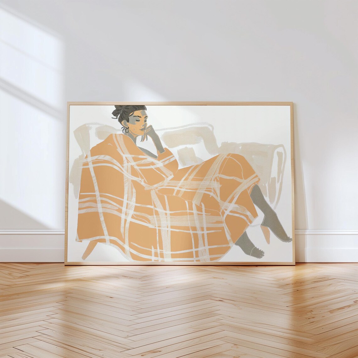 Thoughtful Woman Wrapped in Orange Plaid Blanket Pensive Lounge Poster