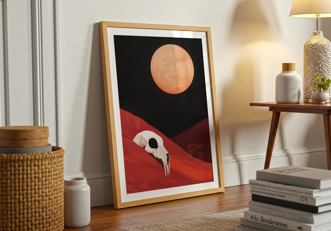 Animal Skull Resting in Red Desert Dunes Under a Huge Orange Moon Poster - Image 3