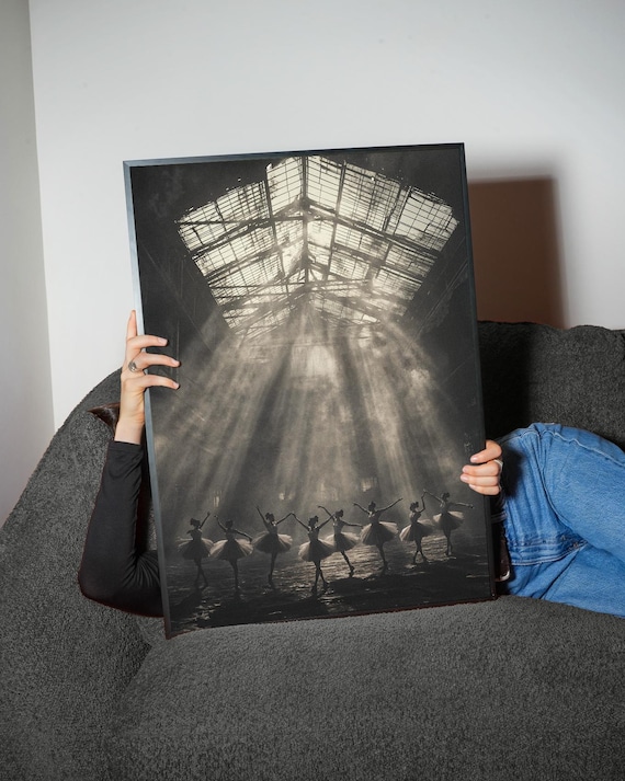 Ballet Dancers Silhouetted in Sunbeams Inside an Industrial Loft Poster