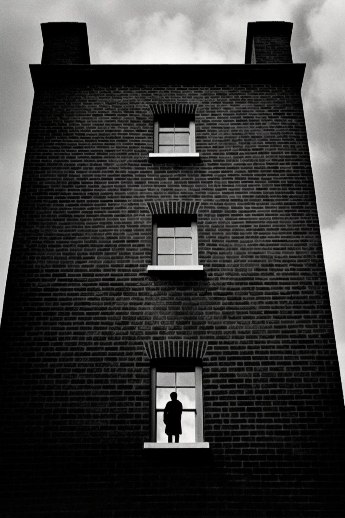 Silhouette in Window of Tall Brick Building Moody Urban Photo Poster