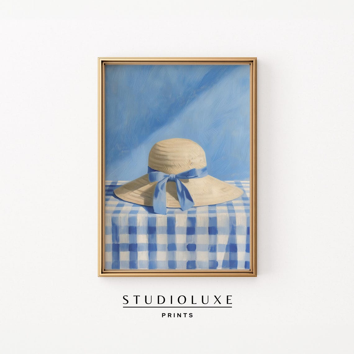 Straw Sun Hat with Blue Ribbon Bow on Gingham Table Cloth Poster