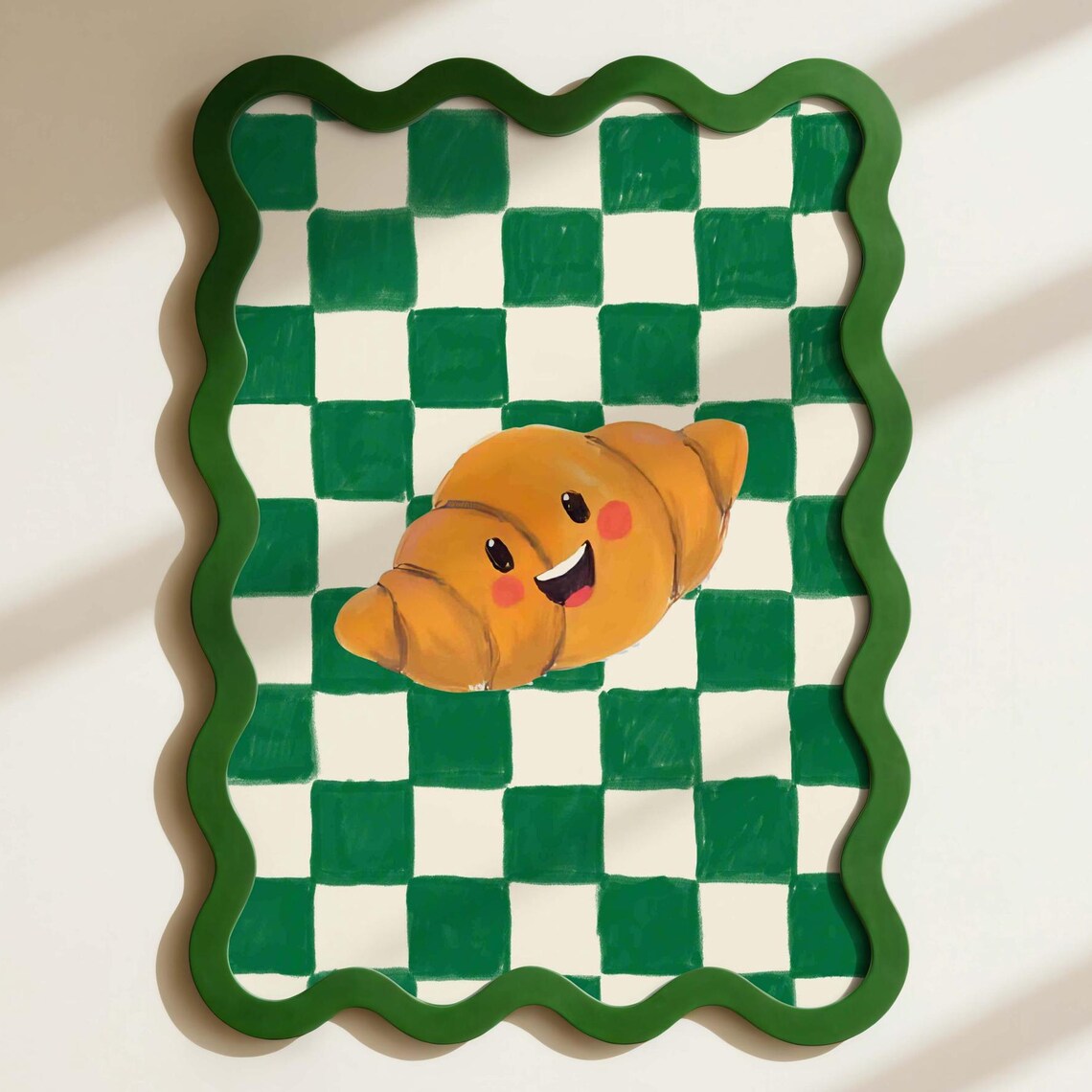 Cute Smiling Croissant Poster on Green Checkerboard with Wavy Frame Art