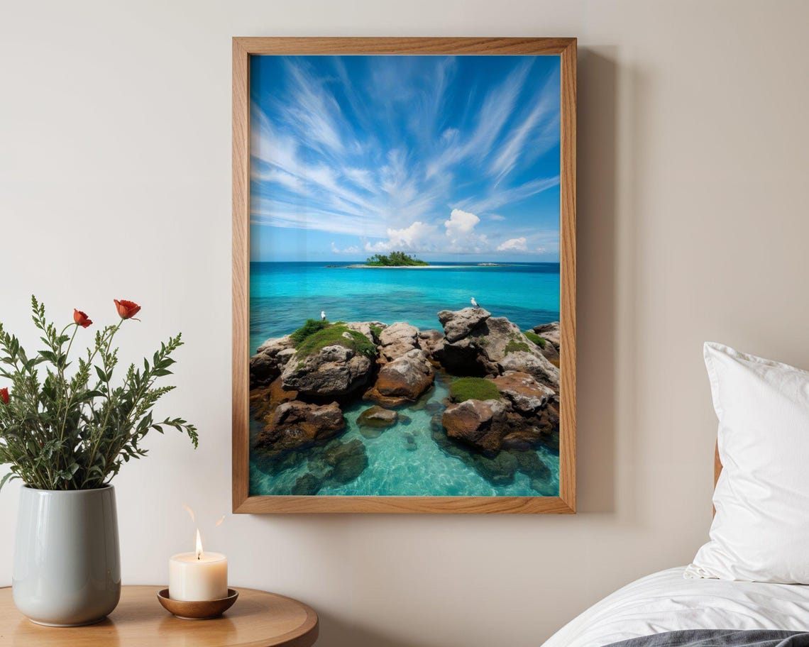 Rocky Shore With Crystal Water and Distant Green Island Poster