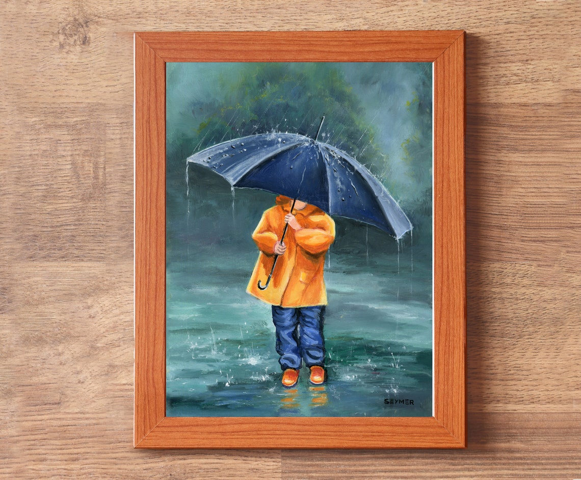 Child in an Orange Raincoat Holding a Navy Umbrella in the Rain Poster