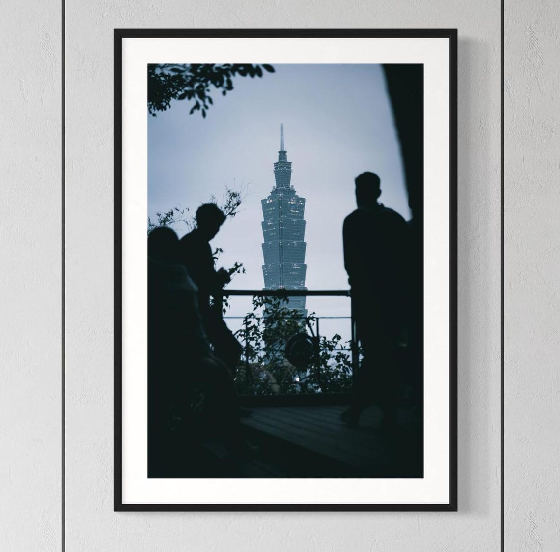 Taipei 101 Tower At Dusk Seen Between Silhouetted Figures Poster