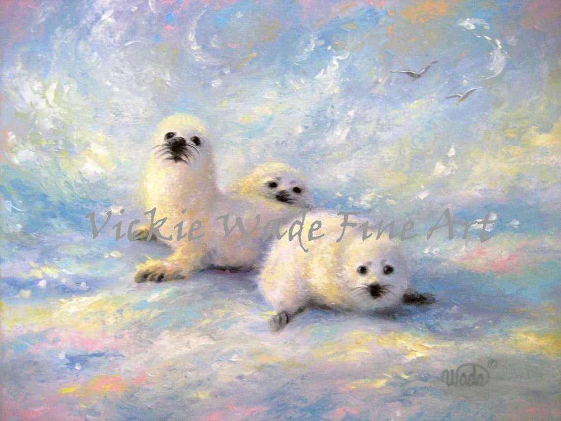 Three Fluffy Baby Harp Seals Resting Together on Icy Snow Poster