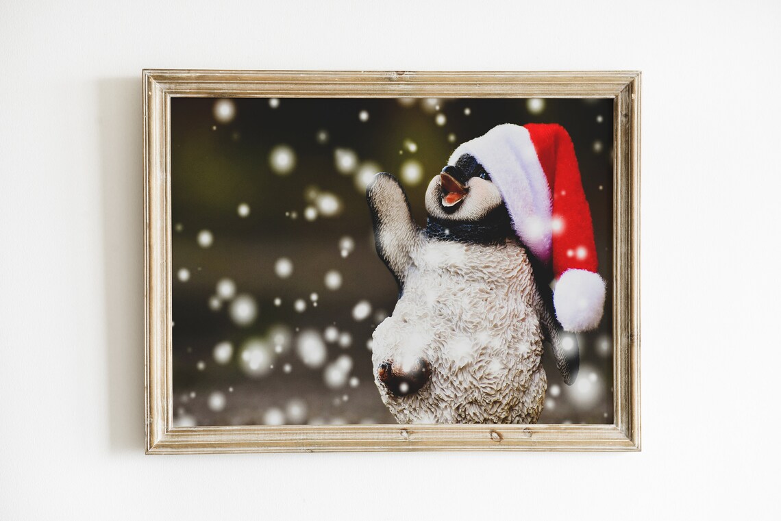 Cute Penguin In Santa Hat Playing In Falling Snow Holiday Poster