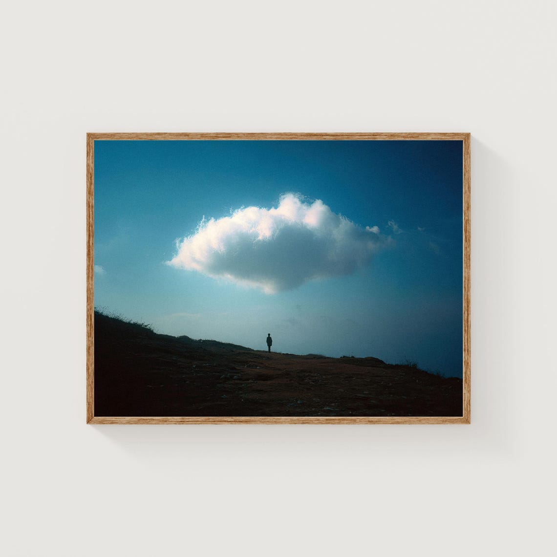 Lone Figure Under a Giant Cloud on Dark Hill Minimalist Art Poster