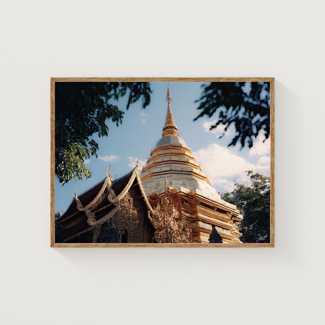 Golden Thai Temple Chedi and Ornate Roofs in Daylight Poster