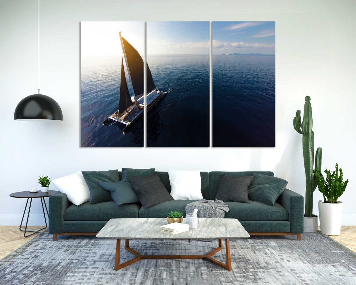 Sailboat With Black Sails Aerial View Calm Blue Ocean Sunset Poster - Image 2