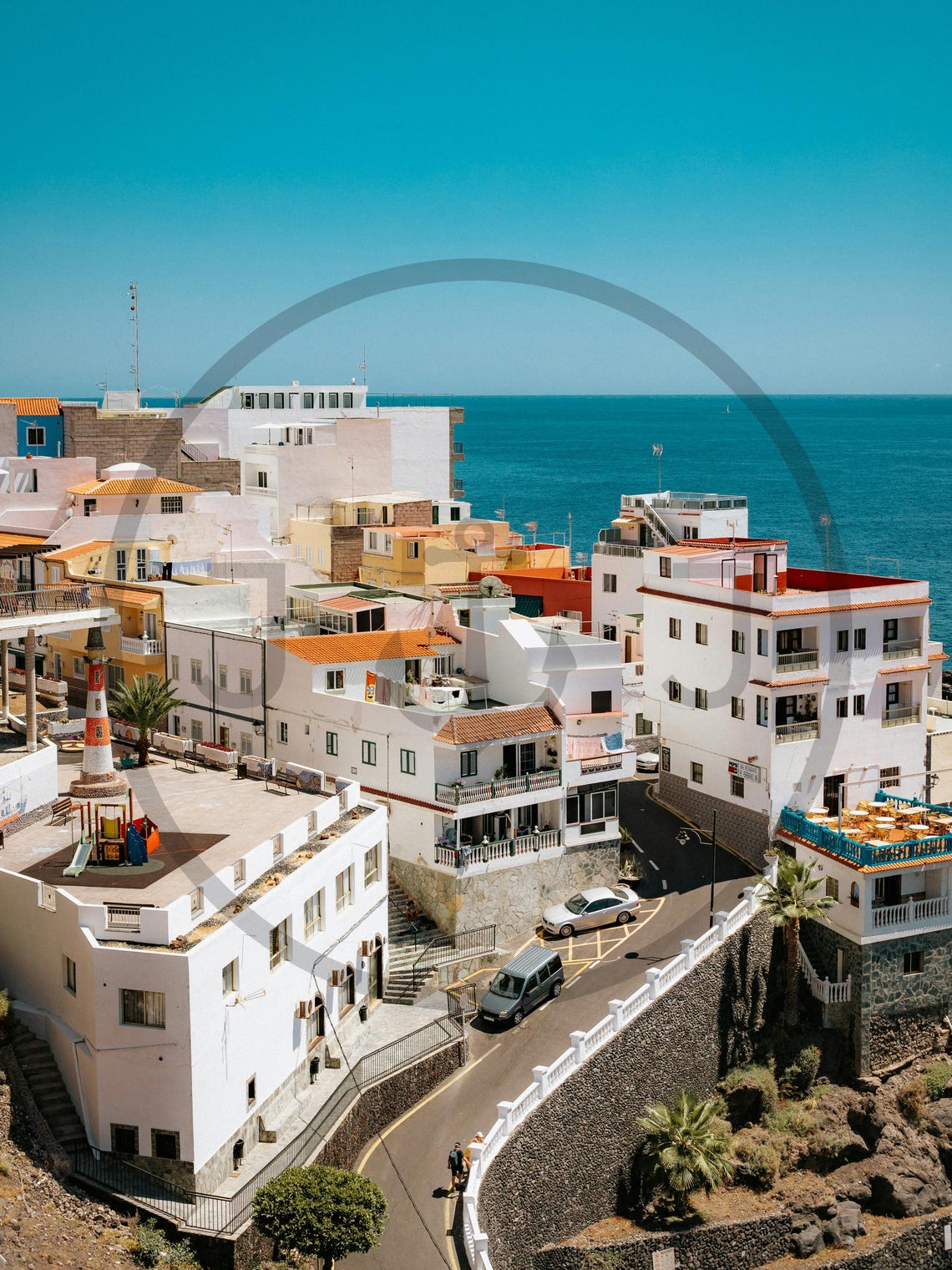 Whitewashed Cliffside Village Overlooking Blue Sea Coast Poster - Image 3