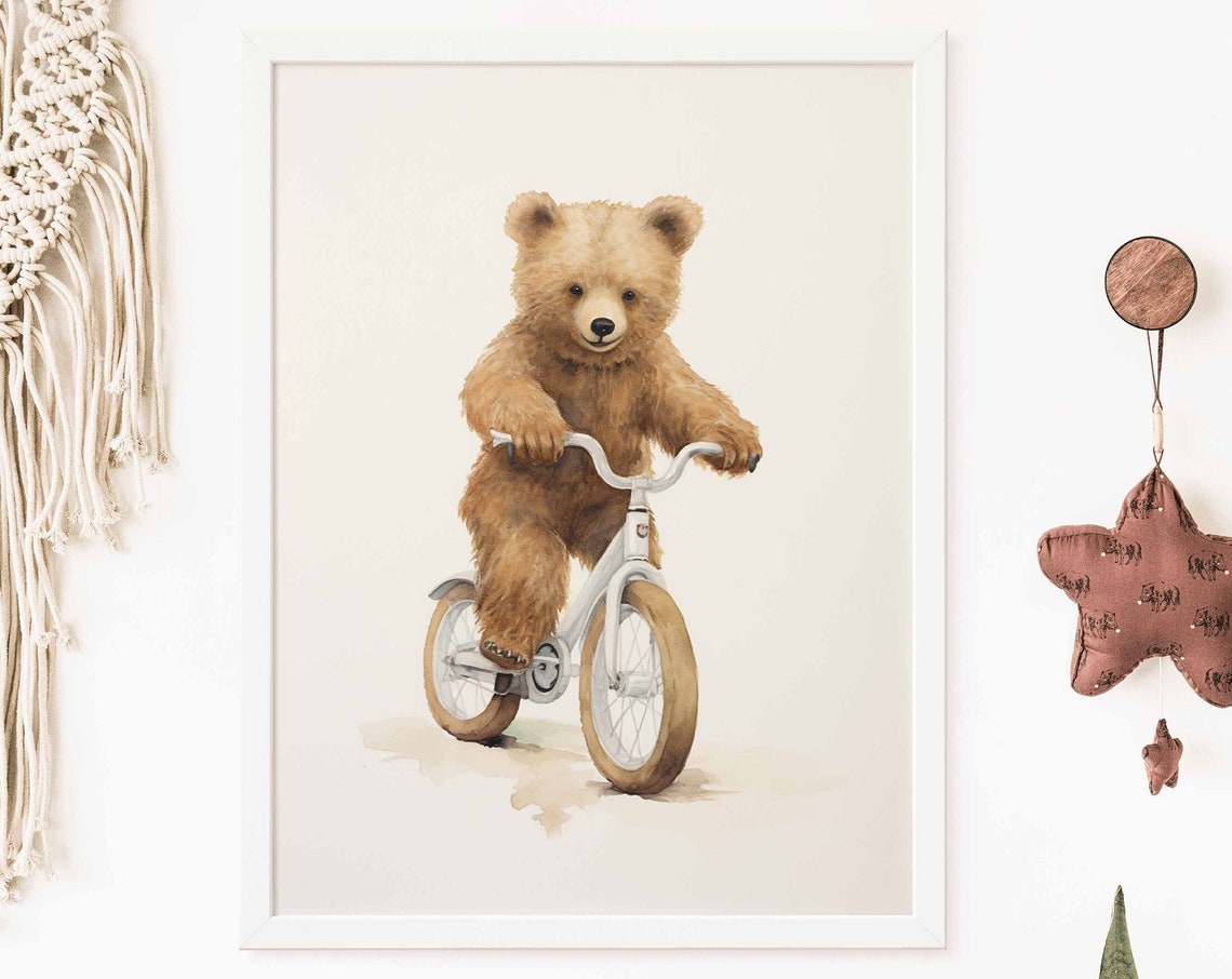 Smiling Watercolor Teddy Bear Riding a Bicycle Nursery Poster