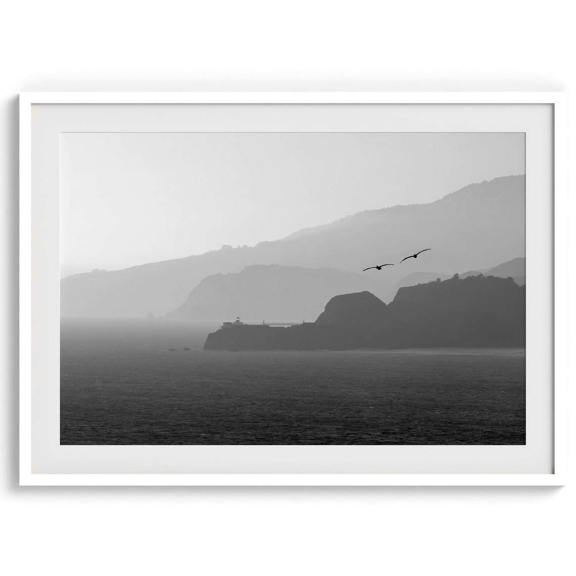 Black And White Seabirds Flying Over Misty Coastline Cliffs Poster - Image 4