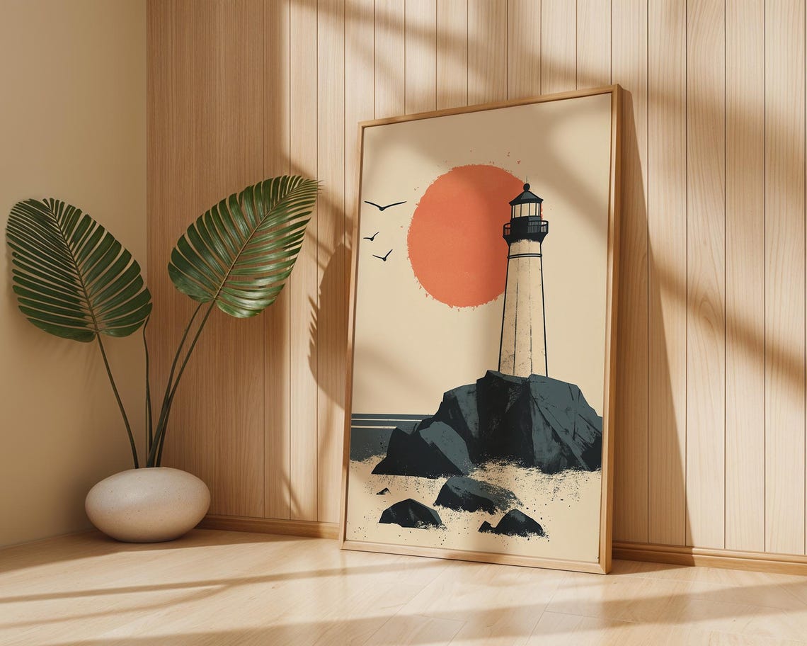 Minimalist Lighthouse on Rocky Shore Under a Big Orange Sun Poster - Image 3