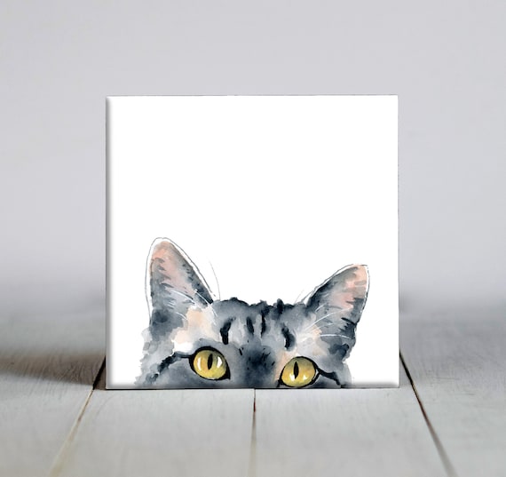 Mischievous Tabby Cat Peeking Over Edge with Golden Eyes Playful Funny Watercolor Poster