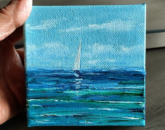 White Sailboat On Turquoise Blue Waves Under Bright Sky Nautical Poster