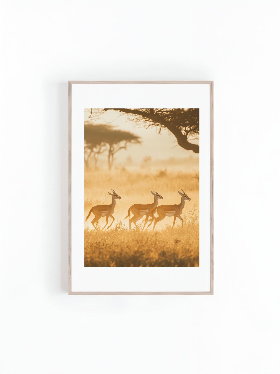 Three Gazelles Running Across A Golden Sunrise Savanna Print