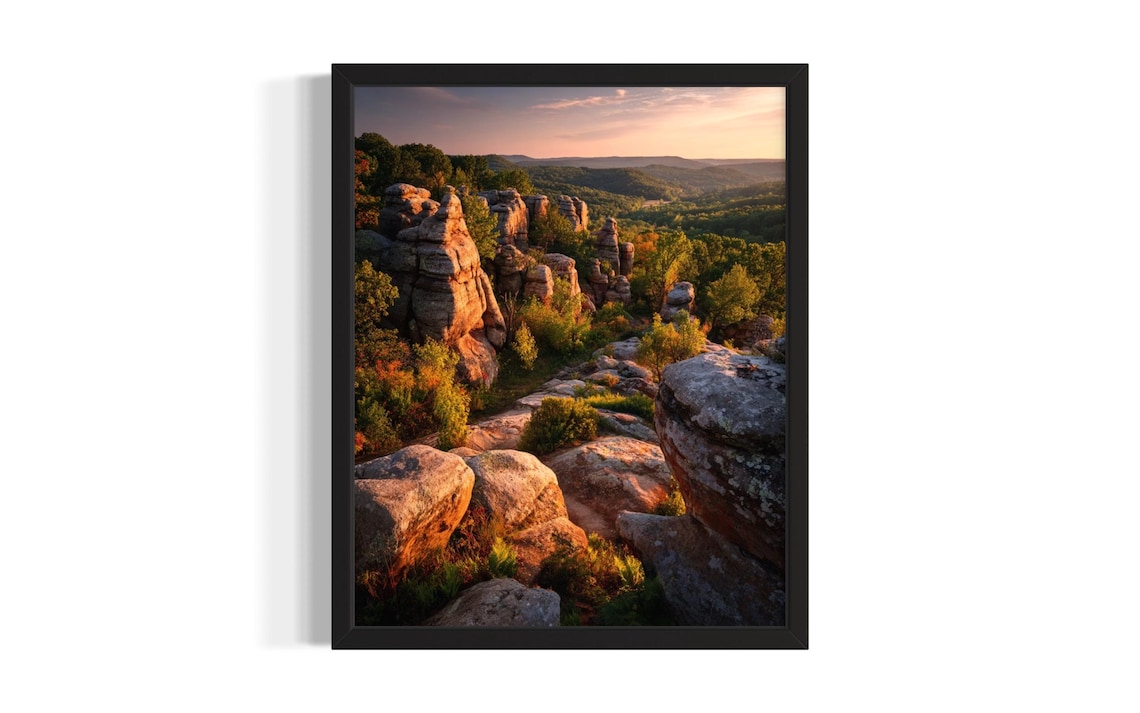 Sunlit Sandstone Rock Formations Over Green Valley Sunset Poster