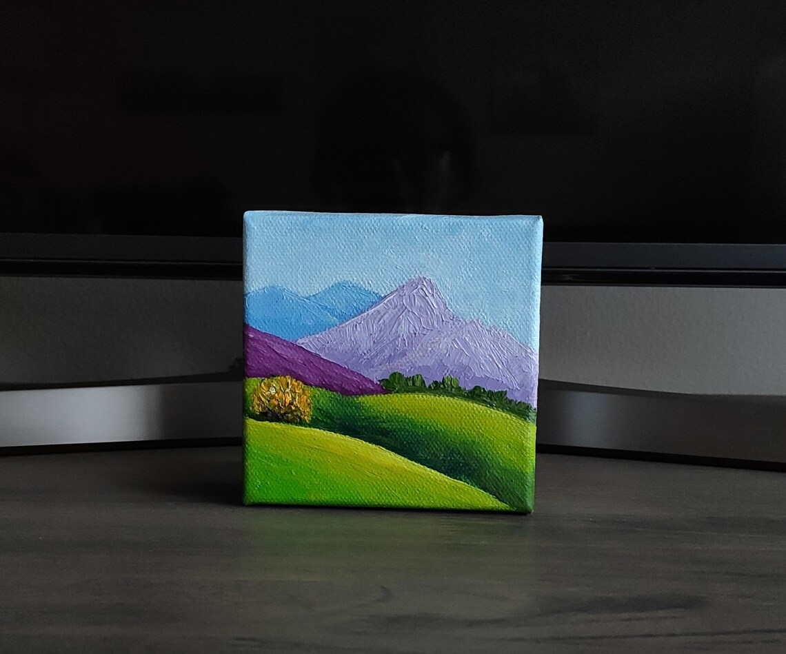 Purple Blue Mountain Peaks Over Green Rolling Hills Landscape Art Poster - Image 3