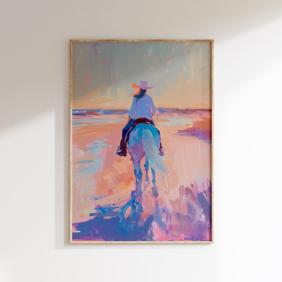 Cowgirl on Horseback Riding into a Pastel Beach Sunset Painting Poster
