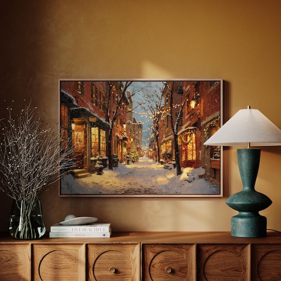 Snowy Christmas Village Street With Glowing Shop Lights Poster