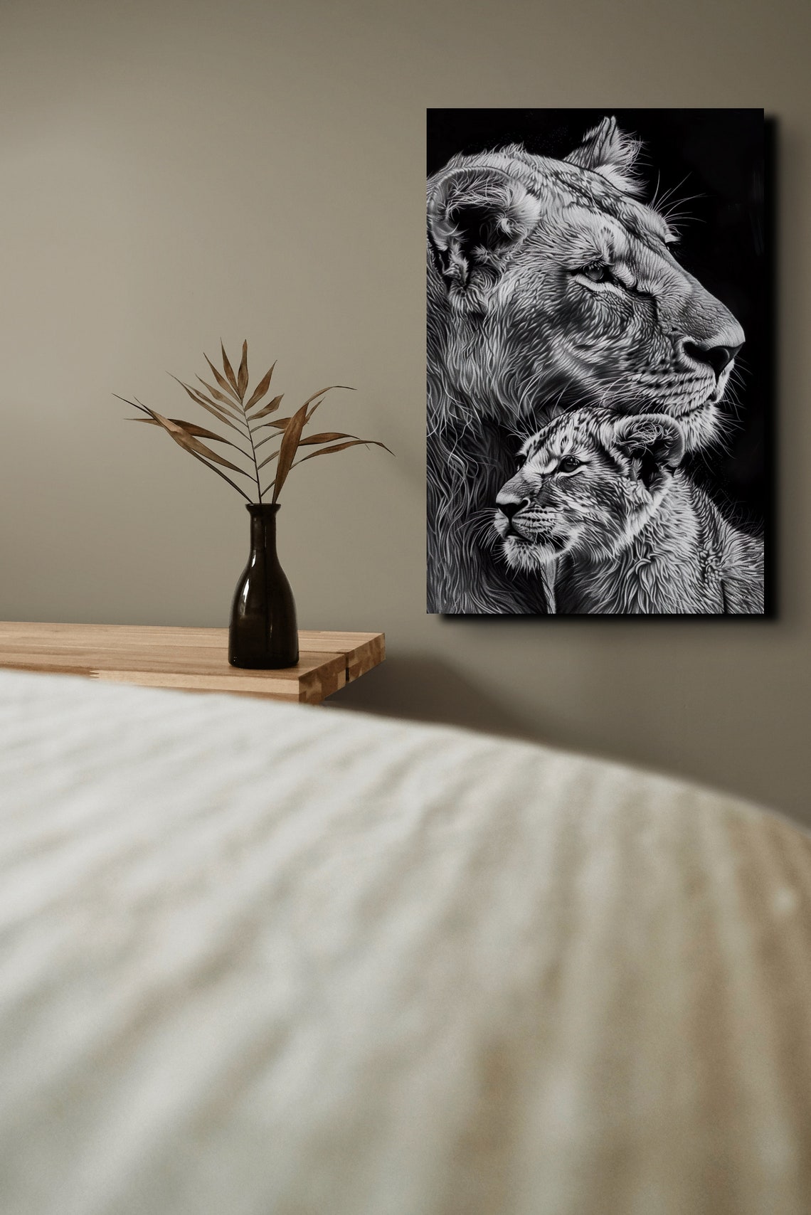 Black and White Lioness and Cub in Profile Beside Branches Poster - Image 4