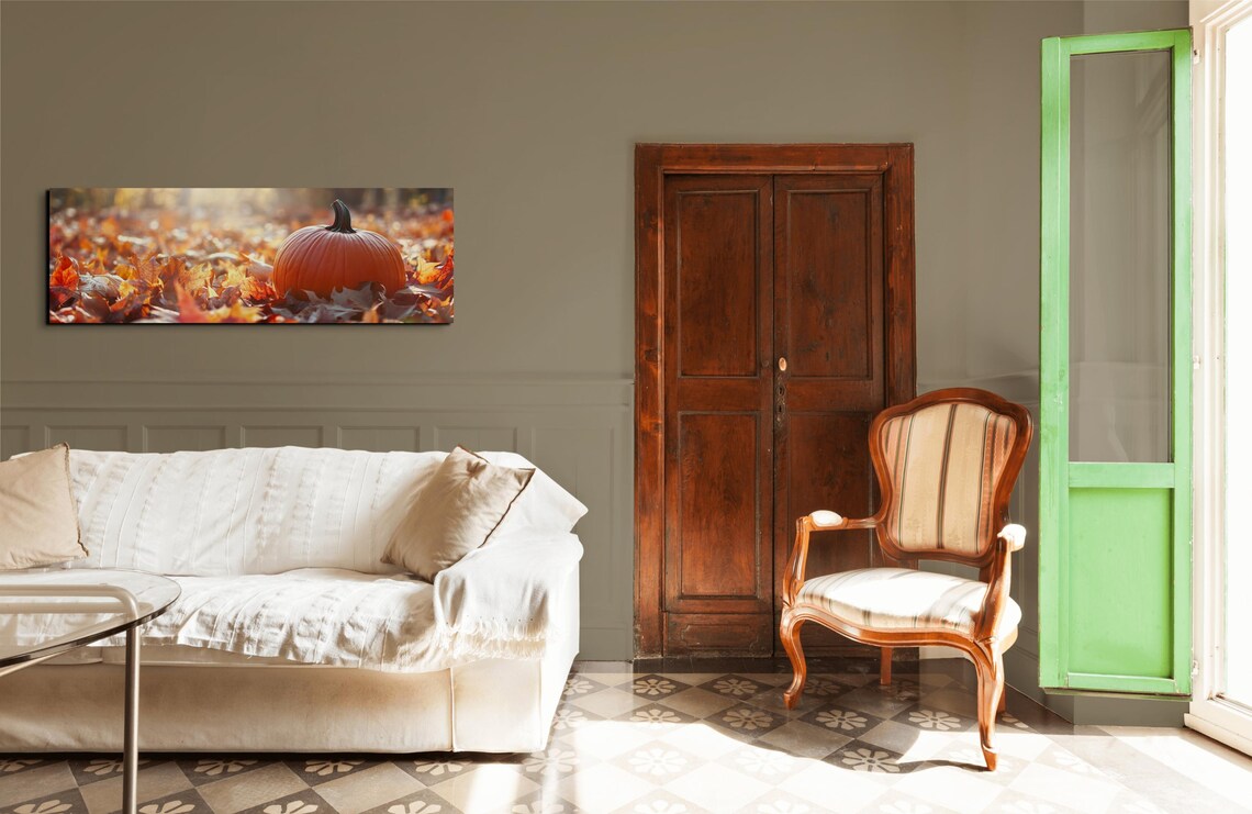 Single Pumpkin Resting in Golden Autumn Leaves Under Soft Sunlight Poster - Image 5