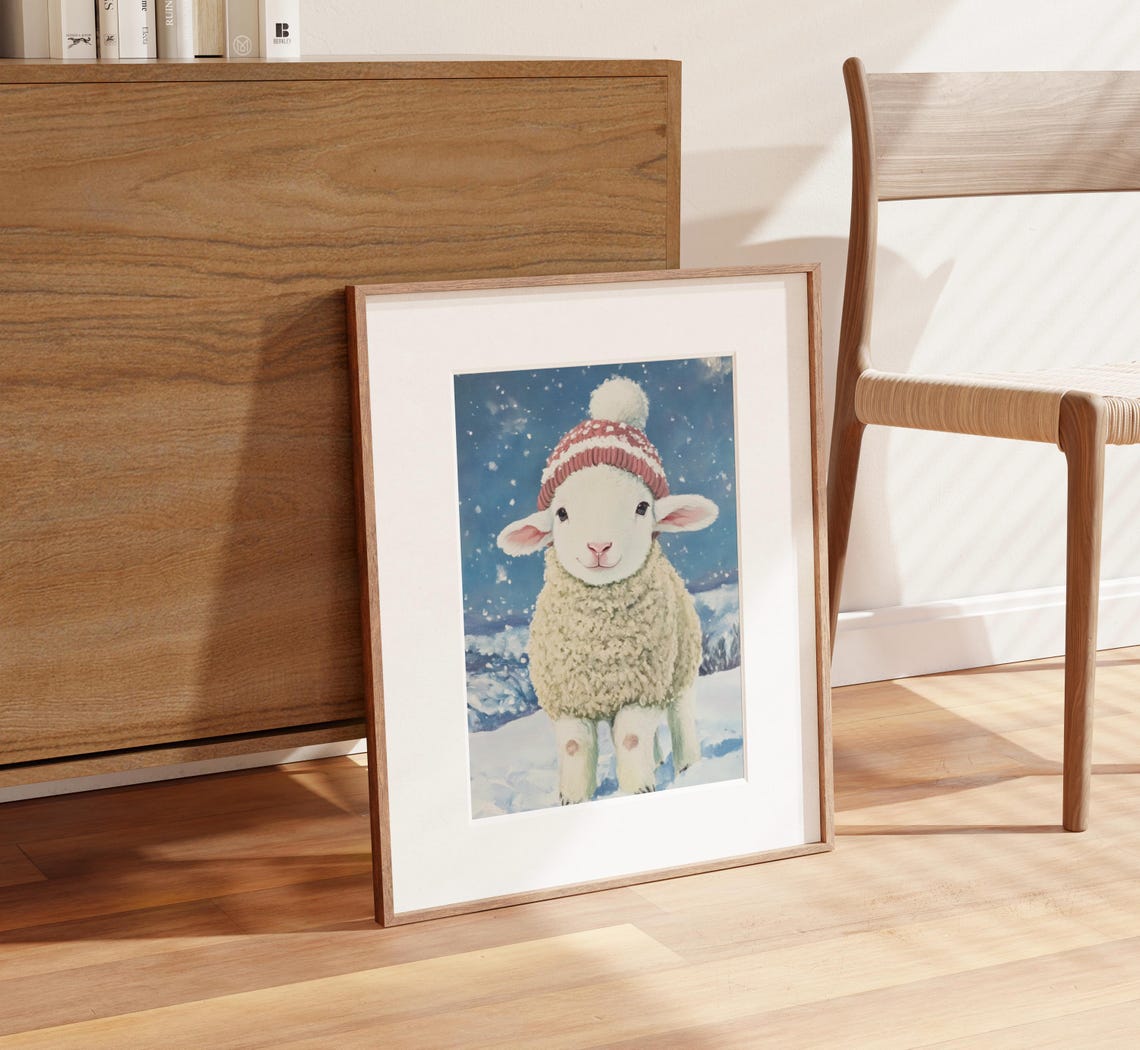 Adorable Lamb Wearing Red Knit Pom Hat in Snowy Winter Poster - Image 2